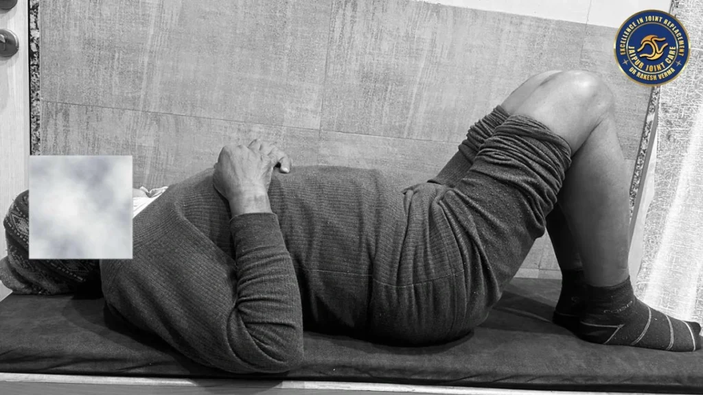 man sleep on the bed after knee replacment at clinic