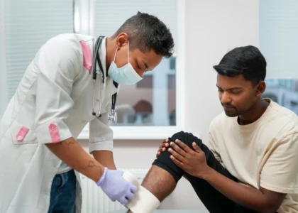 The doctor is checking his own patient